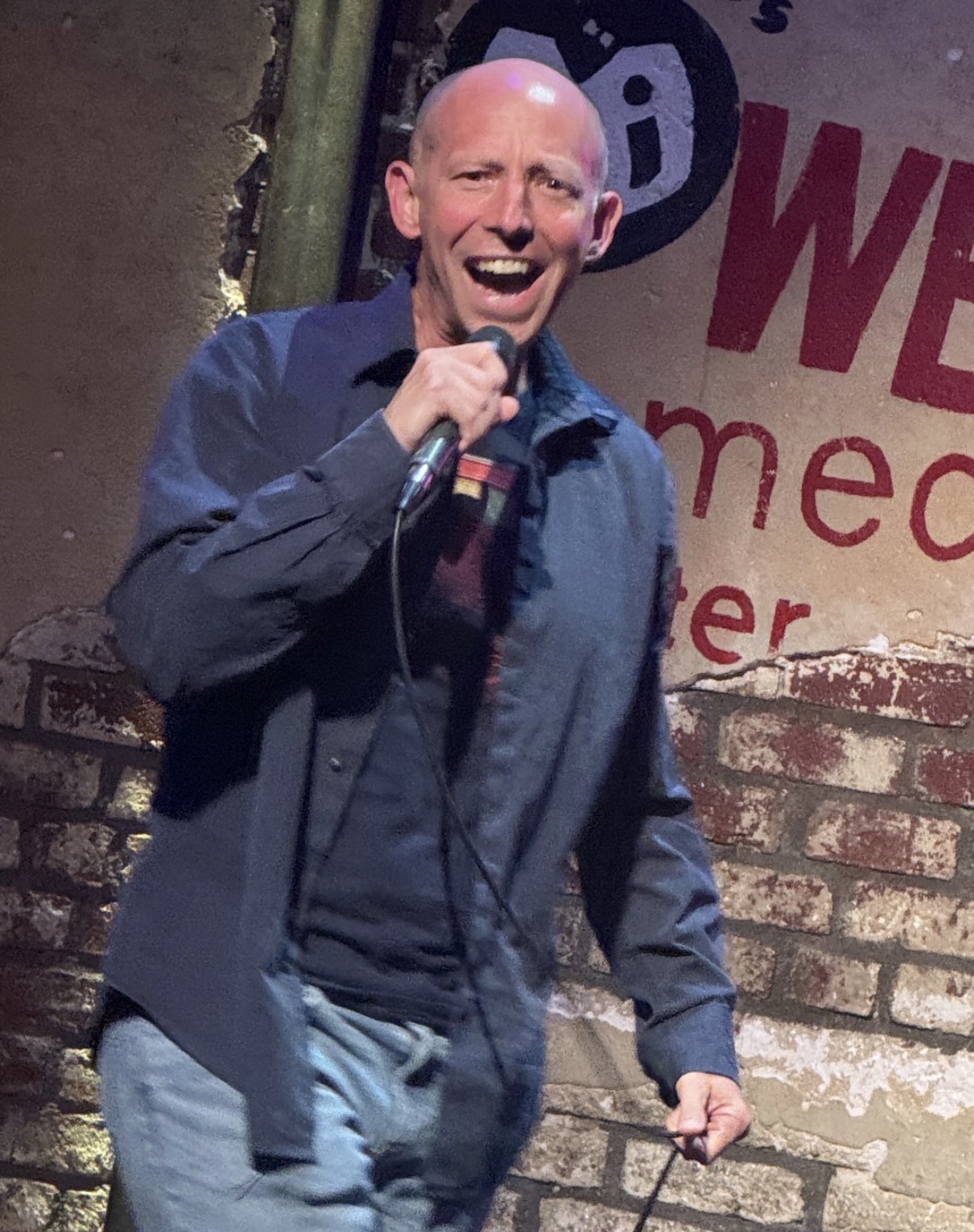 Randy Loveridge performing during a recent stand-up comedy set