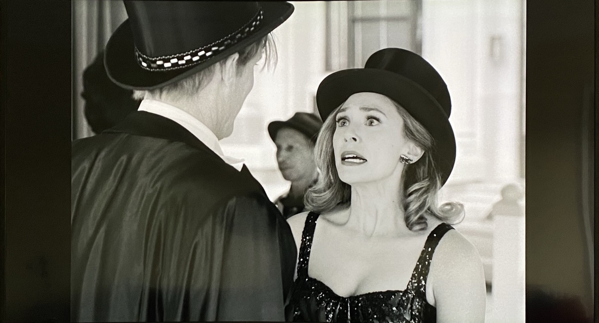 A black-and-white Westview street scene from WandaVision featuring Randy Loveridge